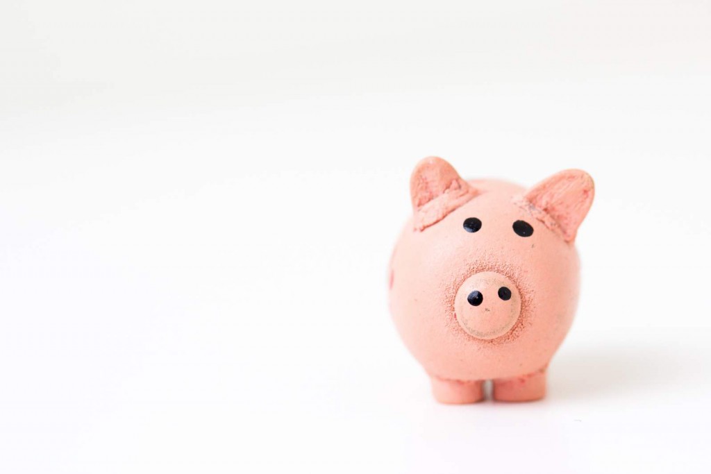 Saving for down payments Classic piggy bank shaped like a pig